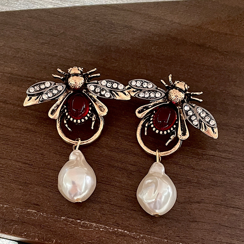 خمر علة الحشرات استرخى أقراط م - مراجعة Vintage Fashion Bug وسعره