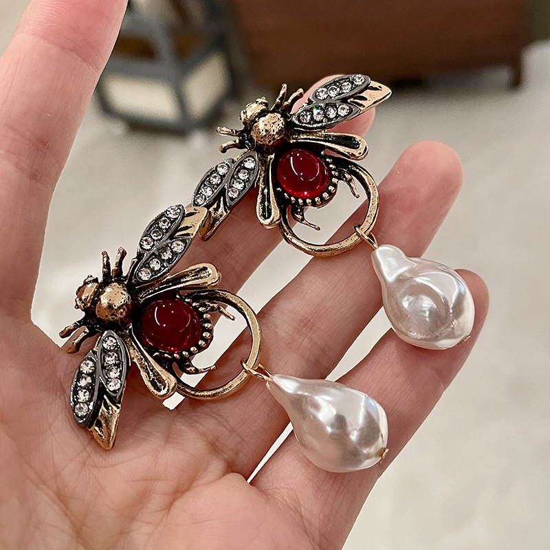 خمر علة الحشرات استرخى أقراط م - مراجعة Vintage Fashion Bug وسعره
